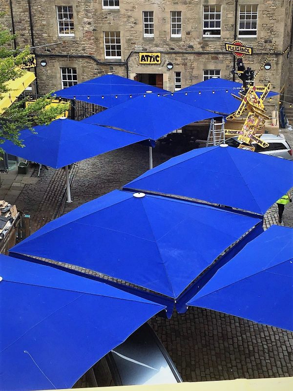 Large blue jumbrellas for Edinburgh Fringe Festival